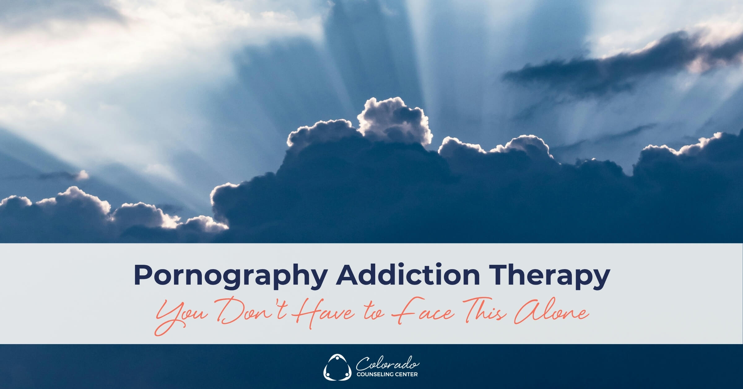 Sunlight breaking through dark clouds with the text "Pornography Addiction Therapy: You Don't Have to Face This Alone"